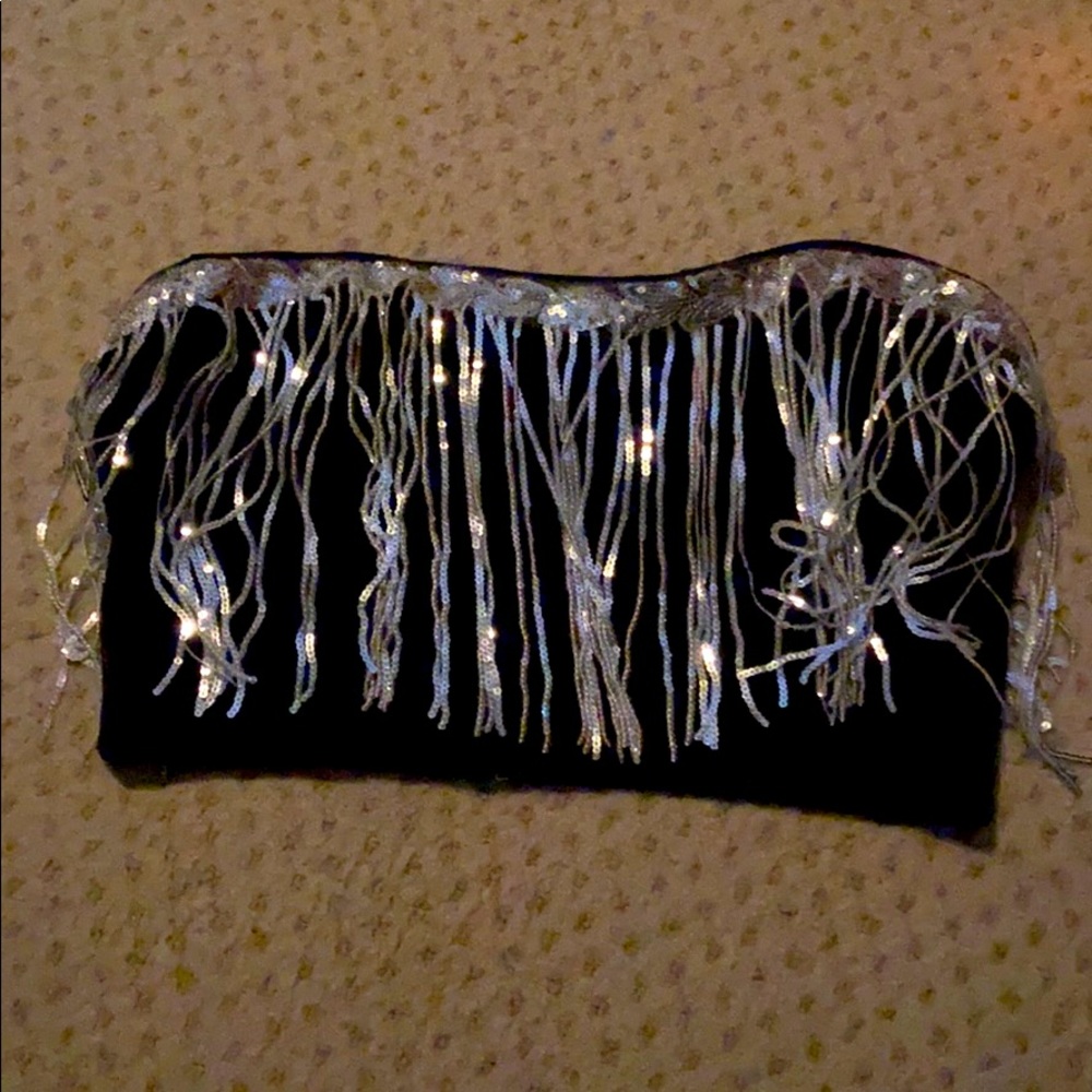 top is super cute super flashy it’s brand new!